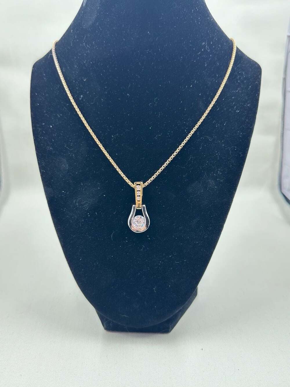 Two-Tone Gold-Plated Stirrup Pendant Necklace with Round Cubic Zirconia